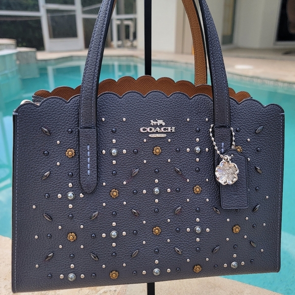 Coach Handbags - GUC Coach Charlie Carry All 28 In Midnight With Prarie Rivets(Interior Flaw)
